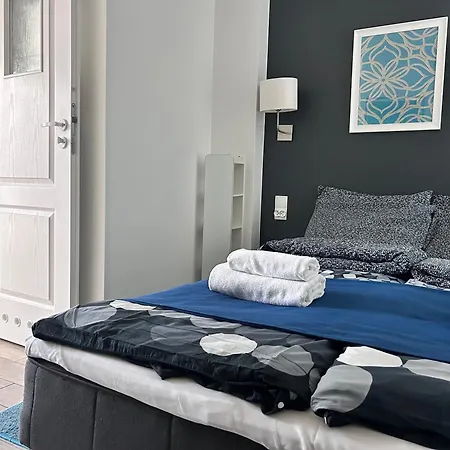 Amber Economy House & *