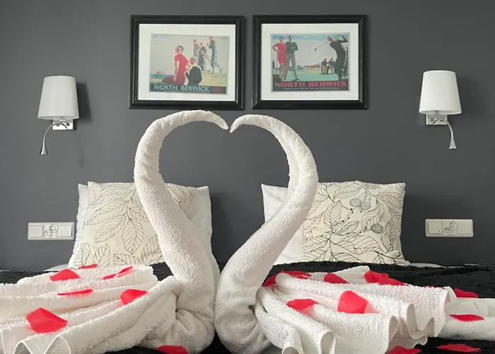 Amber Economy House & *