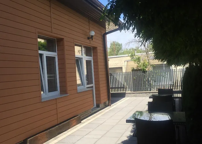 Деревянный коттедж Amber Economy House &